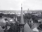 záběr z věže nymburského kostela sv. Jiljí (malý komín zcela vpravo, v pozadí býv. cukrovar, viz areál A15) - foto Karel Tomsa